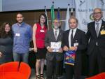 Paolo Pasini e il presidente di Banca Carim Sido Bonfatti consegnano il Premio Rotary Cultura e Territorio per under 35