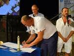 Il momento della firma dell'accordo a Bellaria nel corso del talk show televisivo “Pescatori custodi e sentinelle del mare”