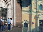 Turisti davanti al cancello chiuso di San Giovanni Evangelista - la facciata di San Giovanni Battista