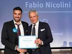 La premiazione di Fabio Nicolini durante la cerimonia di assegnazione tenutasi a Milano